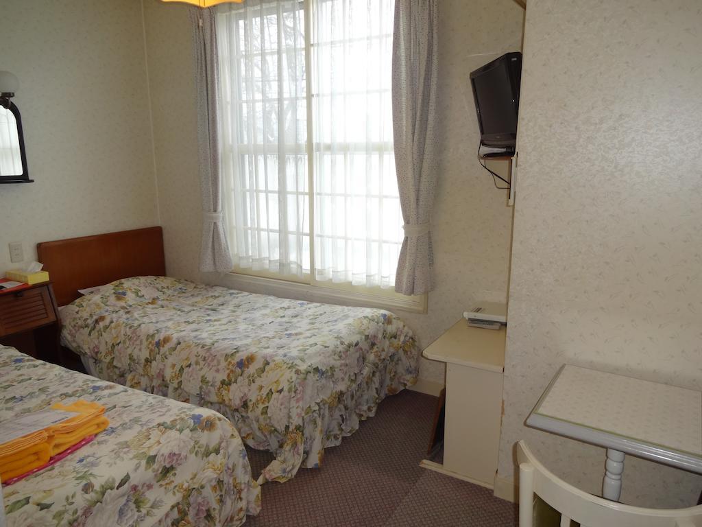 Ishiuchi Pension Bruges Minamiuonuma Quarto foto